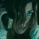 Lana (Natalia Tena) is trying to make a phone call with her gun. It’s not working.